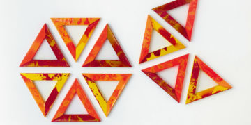 Carla Accardi, Stella (Dieci triangolo rossogialli), 198, sicofoil on painted wooden stretcher, 10 elements, 35×35 cm each, arch. n. 800, Courtesy Archivio Accardi Sanfilippo and Francesca Minini, Photo Andrea Rossetti